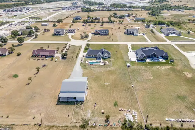Aerial view of the neighborhood and surrounding streets